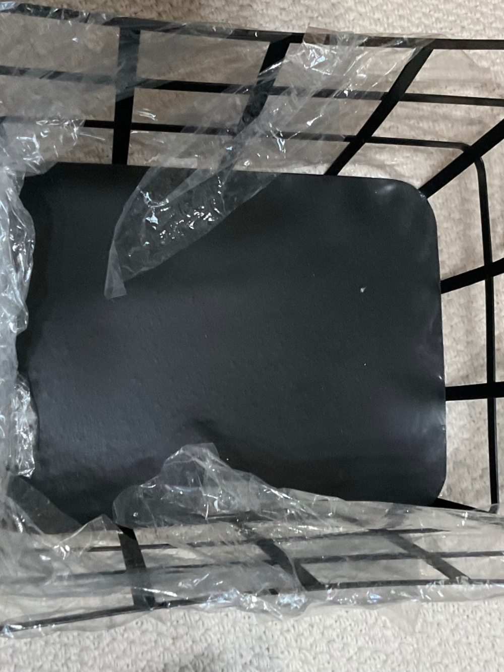 black metal grid basket